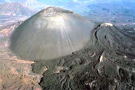 Paricutin current day showing cinder cone and lava flow http://kmapes.weebly.com/ap-notes---volcanoes.html