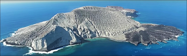 San Benedicto Island from the south. (Screenshot from this video by Jordi Ahumada https://www.youtube.com/watch?v=d9PI_56qobI)